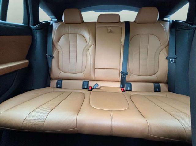 used 2022 BMW X6 car, priced at $52,600