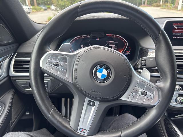 used 2022 BMW 740 car, priced at $50,500
