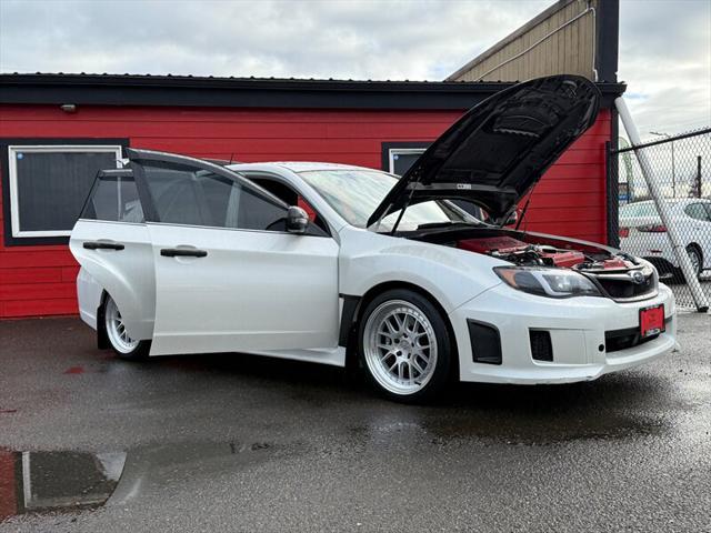 used 2011 Subaru Impreza WRX STi car, priced at $15,995