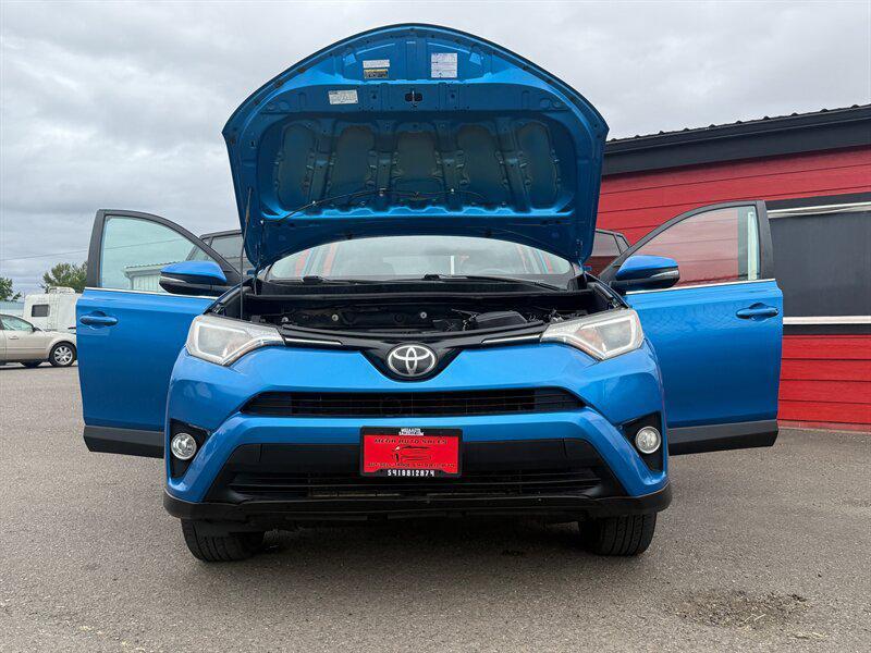 used 2018 Toyota RAV4 car, priced at $14,995