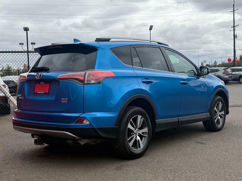 used 2018 Toyota RAV4 car, priced at $14,995