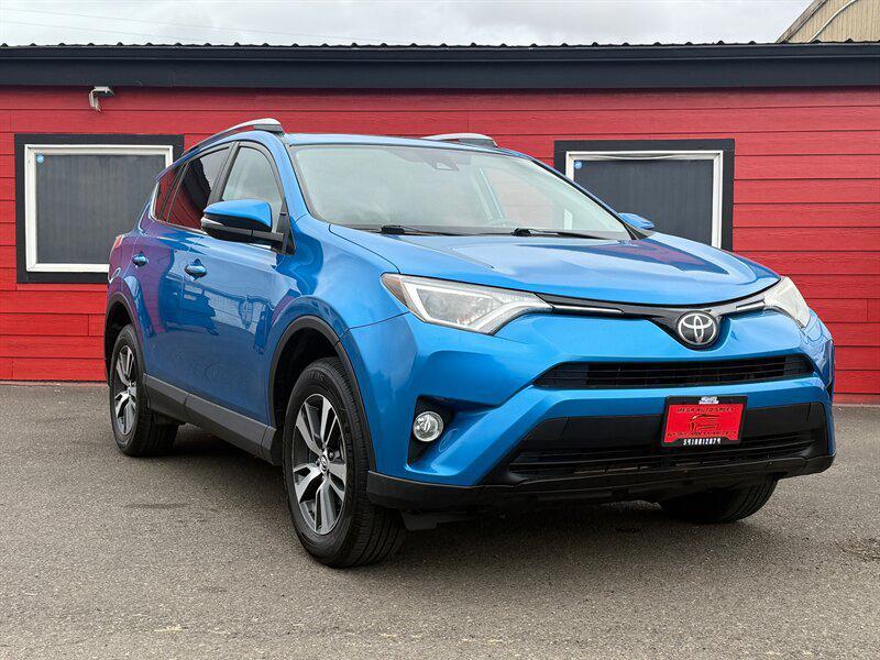 used 2018 Toyota RAV4 car, priced at $14,995