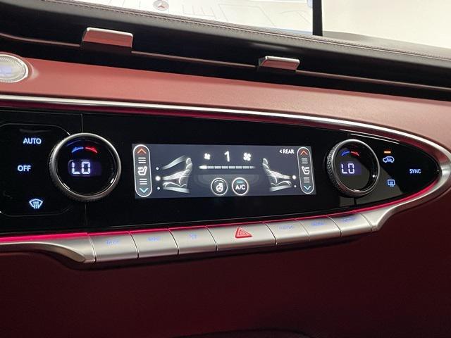 used 2025 Genesis GV70 car, priced at $53,998