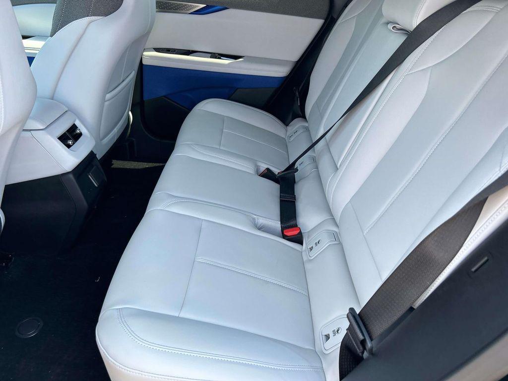 new 2025 Cadillac OPTIQ car, priced at $54,990