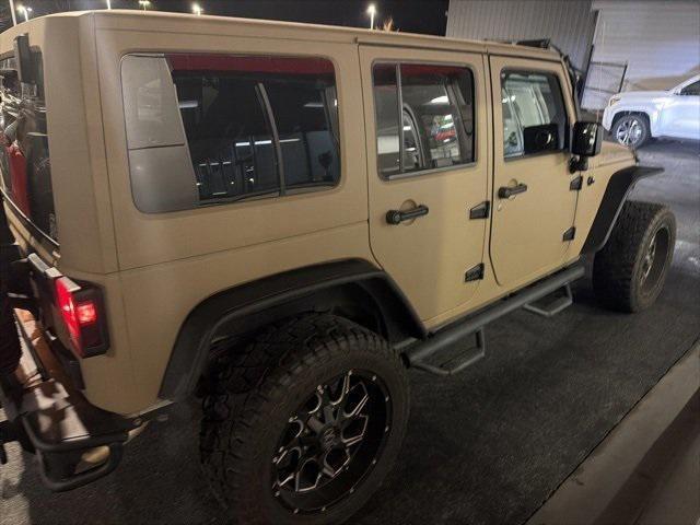 used 2015 Jeep Wrangler Unlimited car, priced at $24,658