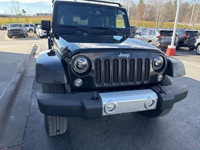 used 2015 Jeep Wrangler Unlimited car, priced at $20,159