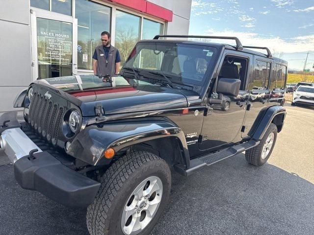used 2015 Jeep Wrangler Unlimited car, priced at $20,159