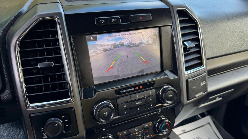 used 2015 Ford F-150 car, priced at $19,488