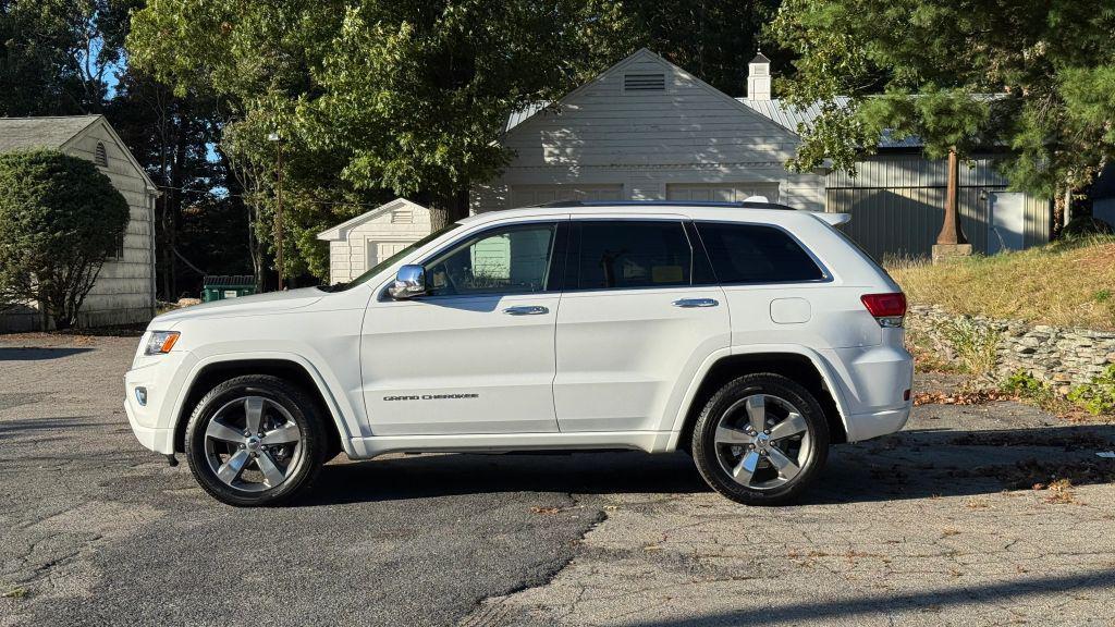 used 2015 Jeep Grand Cherokee car, priced at $14,495