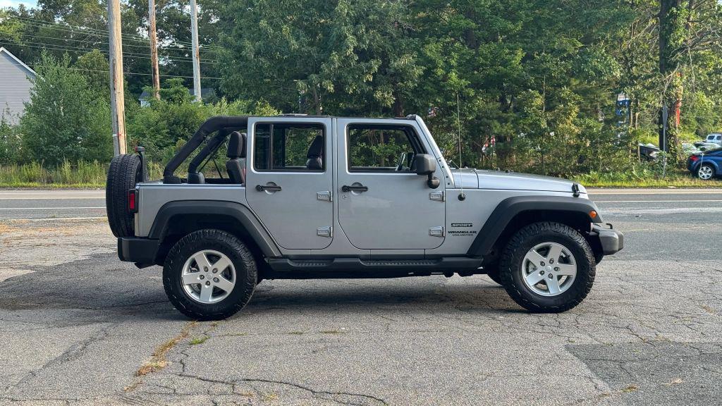 used 2014 Jeep Wrangler Unlimited car, priced at $20,998
