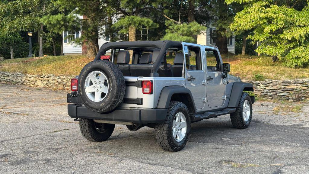 used 2014 Jeep Wrangler Unlimited car, priced at $20,998