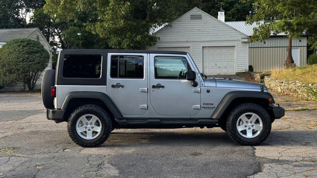 used 2014 Jeep Wrangler Unlimited car, priced at $20,998