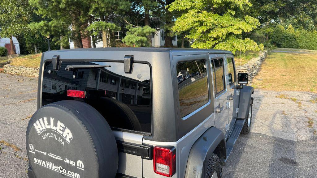 used 2014 Jeep Wrangler Unlimited car, priced at $20,998