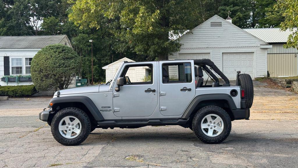used 2014 Jeep Wrangler Unlimited car, priced at $20,998