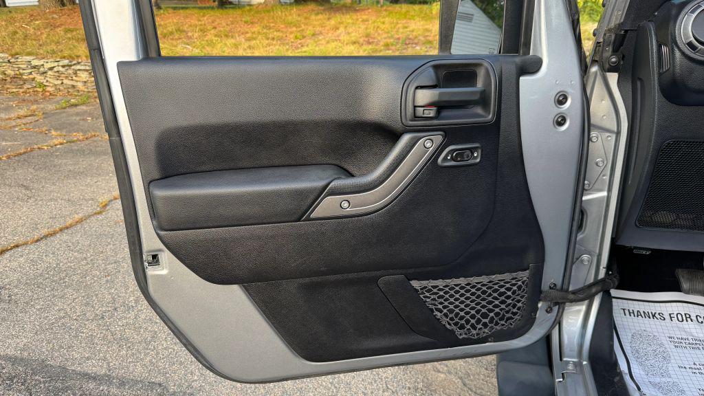 used 2014 Jeep Wrangler Unlimited car, priced at $20,998