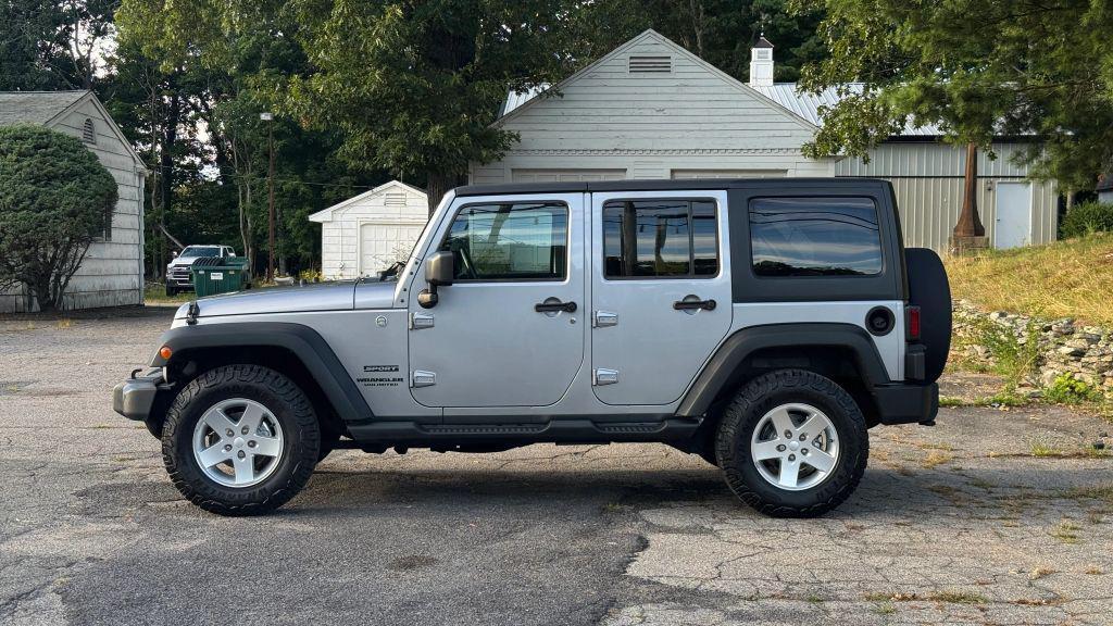 used 2014 Jeep Wrangler Unlimited car, priced at $20,998