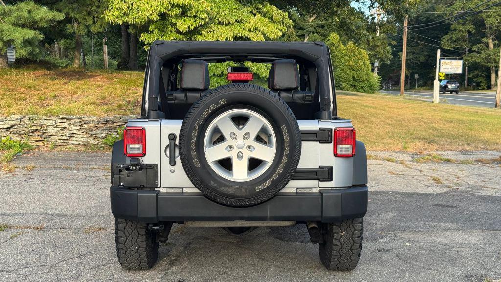 used 2014 Jeep Wrangler Unlimited car, priced at $20,998