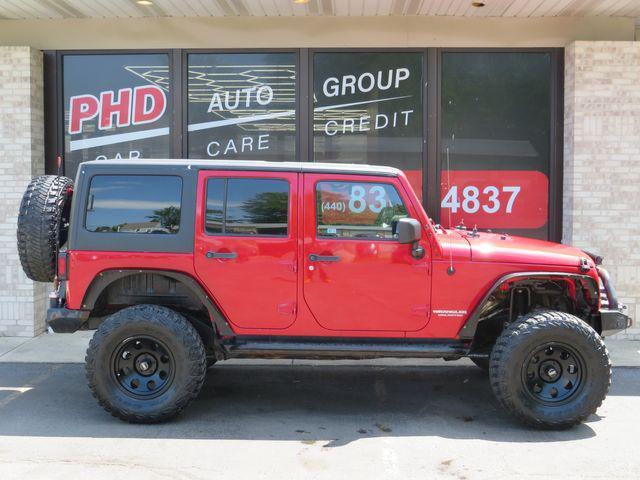 used 2012 Jeep Wrangler Unlimited car, priced at $19,997