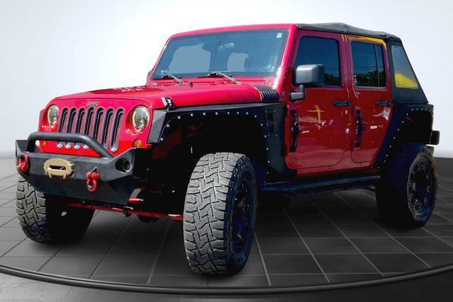 used 2012 Jeep Wrangler Unlimited car, priced at $17,897