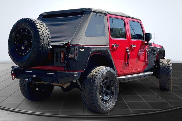 used 2012 Jeep Wrangler Unlimited car, priced at $17,897
