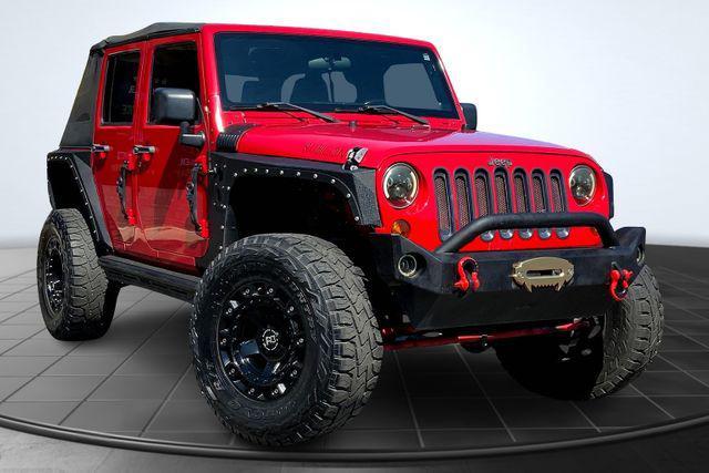 used 2012 Jeep Wrangler Unlimited car, priced at $18,997
