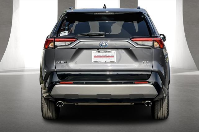 used 2022 Toyota RAV4 Hybrid car, priced at $29,392