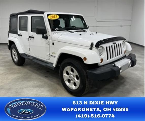 used 2013 Jeep Wrangler Unlimited car, priced at $16,765