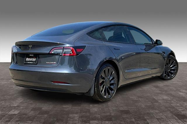 used 2022 Tesla Model 3 car, priced at $30,057