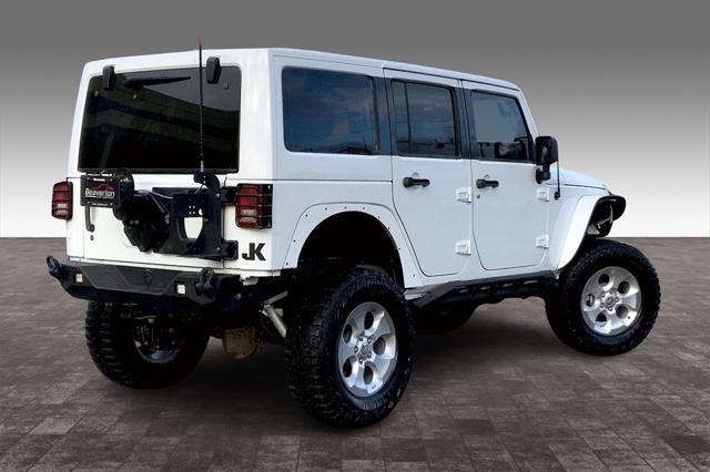 used 2012 Jeep Wrangler Unlimited car, priced at $18,669