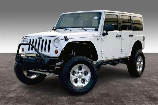 used 2012 Jeep Wrangler Unlimited car, priced at $18,669