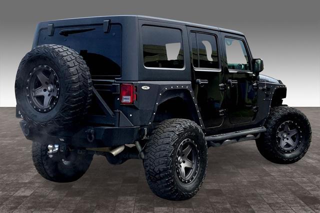 used 2016 Jeep Wrangler Unlimited car, priced at $26,392