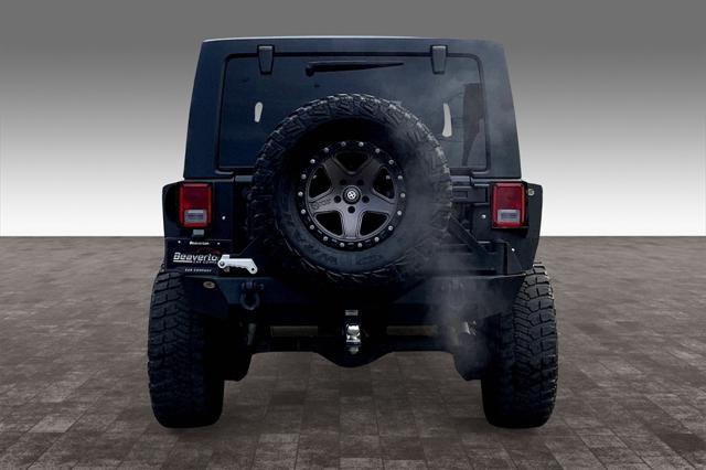 used 2016 Jeep Wrangler Unlimited car, priced at $26,392