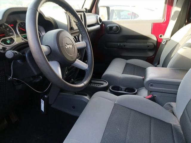 used 2010 Jeep Wrangler Unlimited car, priced at $16,062