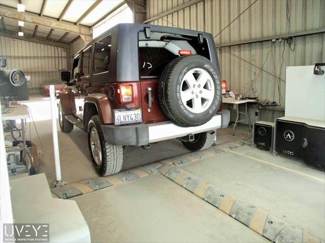 used 2010 Jeep Wrangler Unlimited car, priced at $16,062