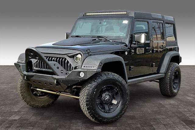 used 2014 Jeep Wrangler Unlimited car, priced at $22,995