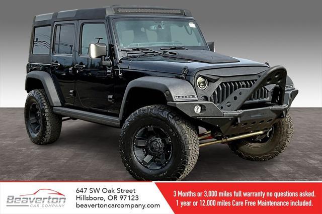 used 2014 Jeep Wrangler Unlimited car, priced at $22,995