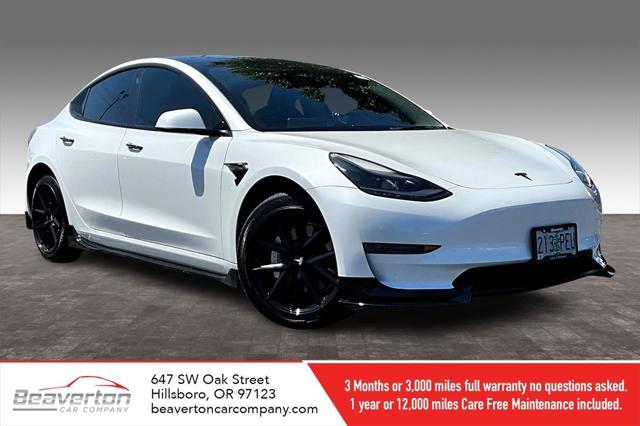 used 2023 Tesla Model 3 car, priced at $27,433