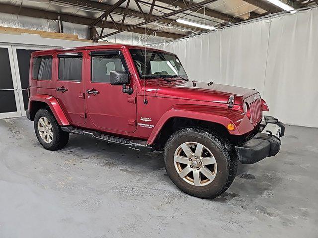 used 2012 Jeep Wrangler Unlimited car, priced at $15,680