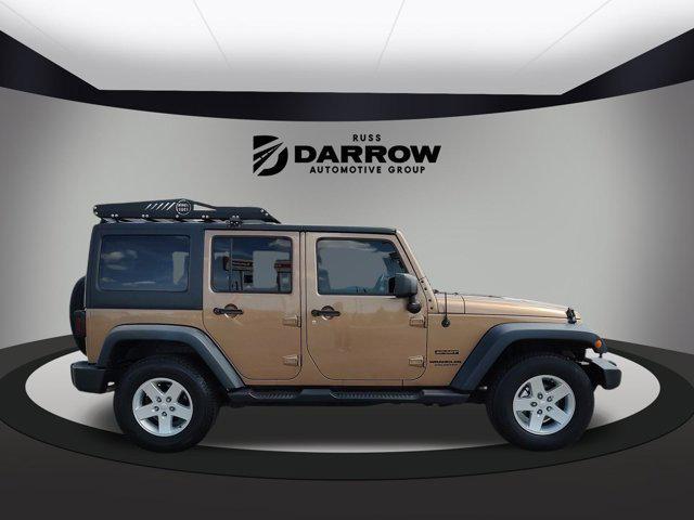 used 2015 Jeep Wrangler Unlimited car, priced at $16,250