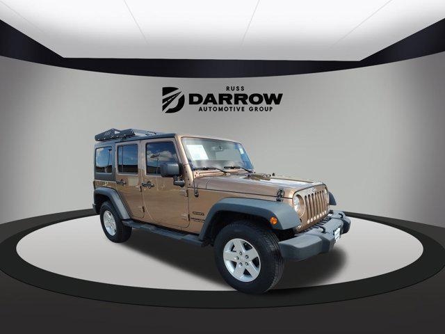 used 2015 Jeep Wrangler Unlimited car, priced at $16,250