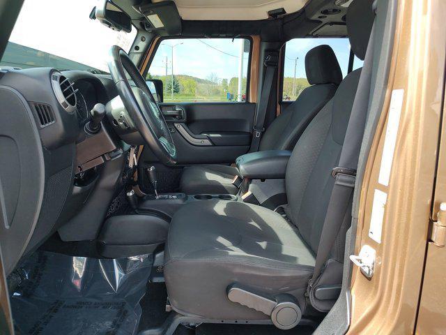 used 2015 Jeep Wrangler Unlimited car, priced at $16,250