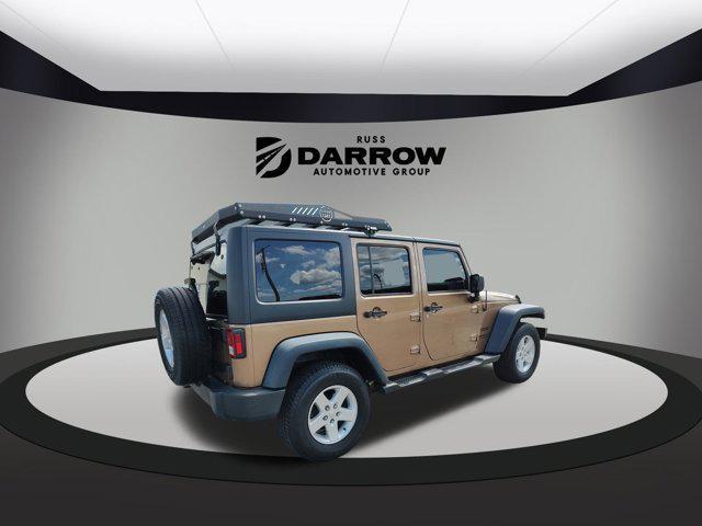 used 2015 Jeep Wrangler Unlimited car, priced at $16,250