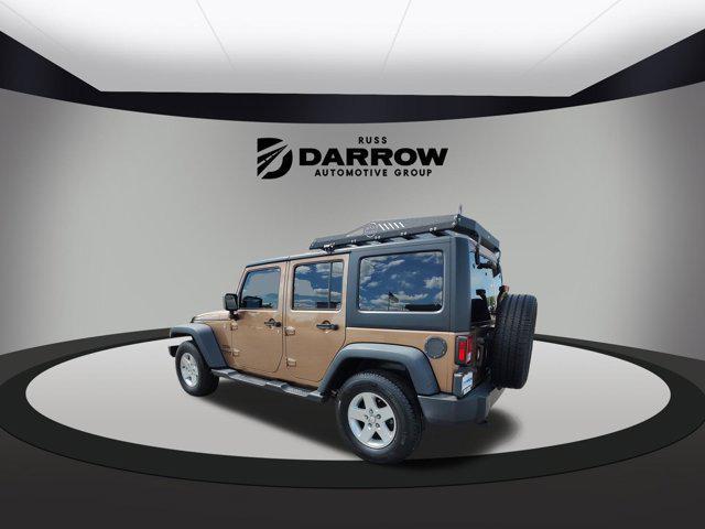 used 2015 Jeep Wrangler Unlimited car, priced at $16,250