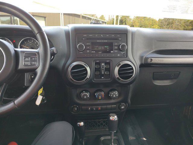 used 2015 Jeep Wrangler Unlimited car, priced at $16,250