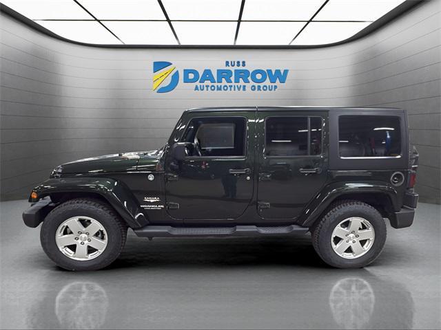 used 2011 Jeep Wrangler Unlimited car, priced at $10,238