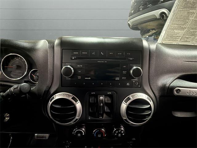 used 2011 Jeep Wrangler Unlimited car, priced at $10,238