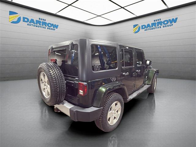 used 2011 Jeep Wrangler Unlimited car, priced at $10,238