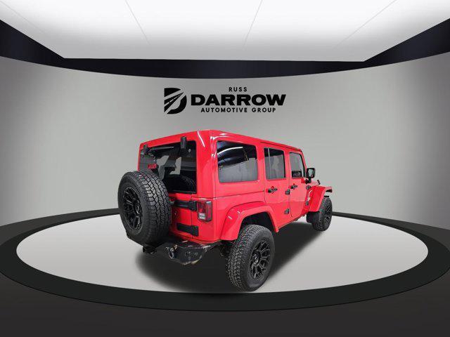 used 2015 Jeep Wrangler Unlimited car, priced at $18,038