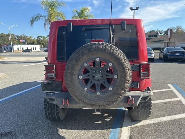 used 2012 Jeep Wrangler Unlimited car, priced at $21,275