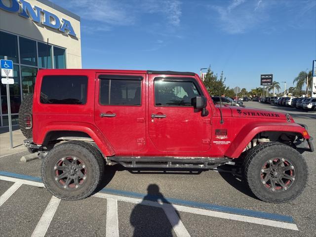 used 2012 Jeep Wrangler Unlimited car, priced at $21,275